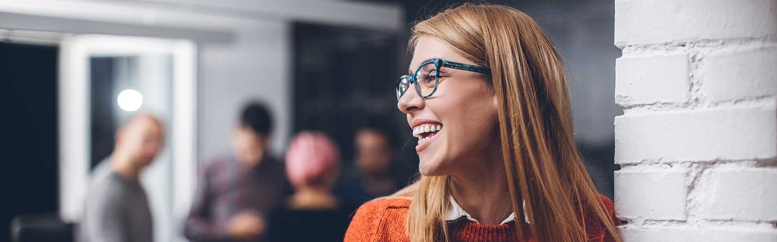 Women in the office laughing