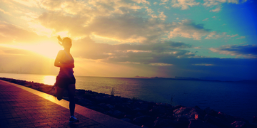 woman running during sunset